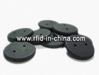 Button-sized RFID tag designed for laundry garment tracking Button-sized RFID tag designed for laundry garment tracking